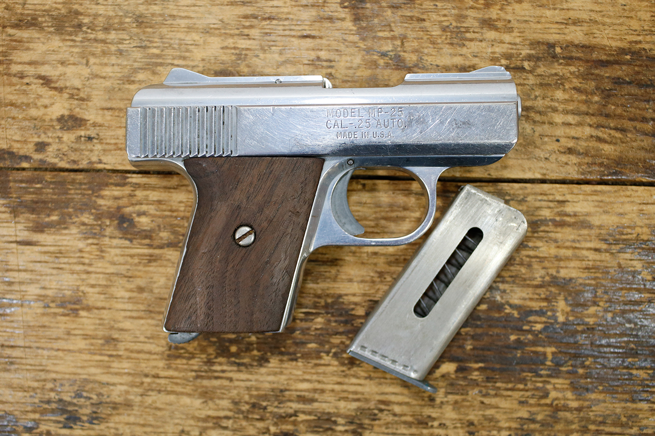Raven Arms MP 25 25 Auto Police Trade IN Pistol with White Grips 2