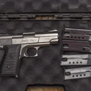 Bryco Jennings Nine-CA 9mm Police Trade-In Pistol with Pistol Case and