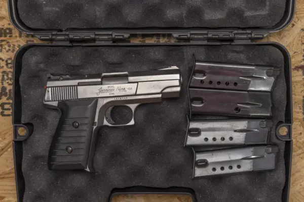 Bryco Jennings Nine-CA 9mm Police Trade-In Pistol with Pistol Case and