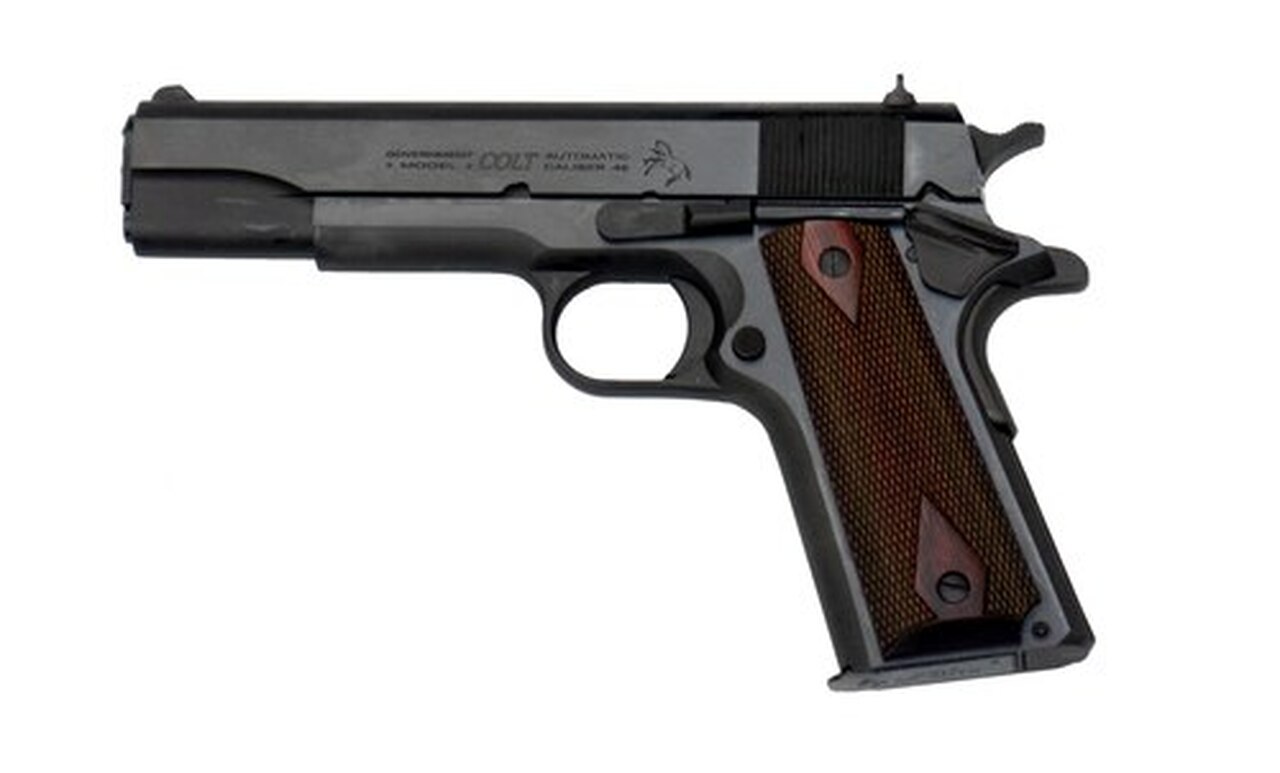 Colt 1911 Government. 45 ACP, 5″ Barrel, 7rd Mag, Rosewood Grip, Blued